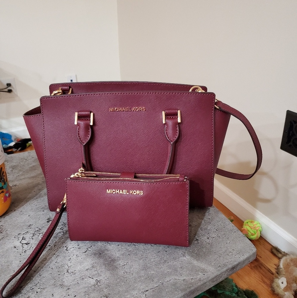 Matching Michael Kors bag and wristlet